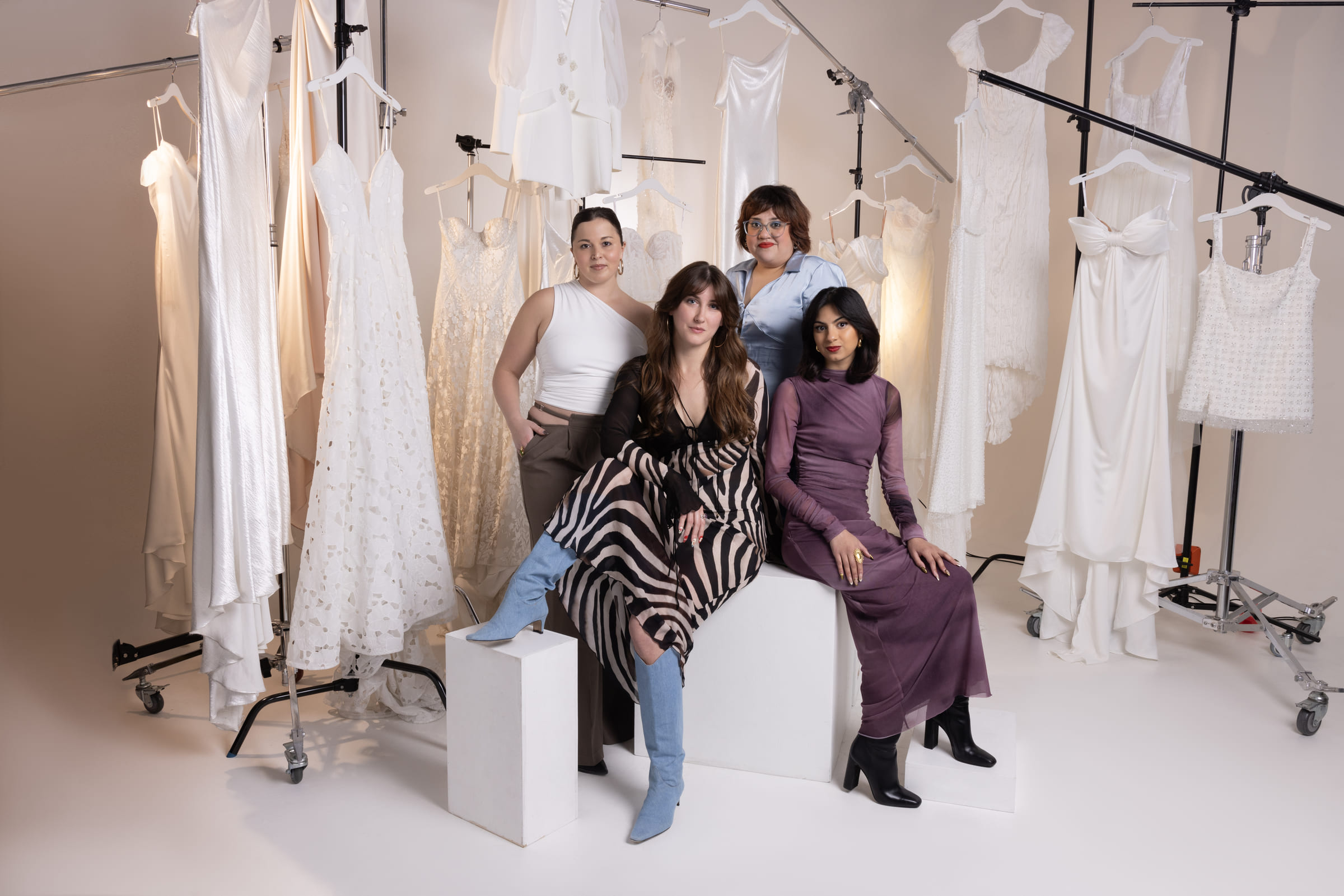 Business marketing photography for a Houston bridal boutique - owners and team on the retail floor